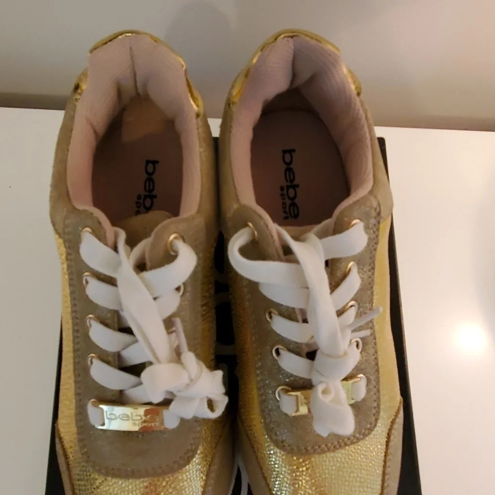 Bebe gold sneakers